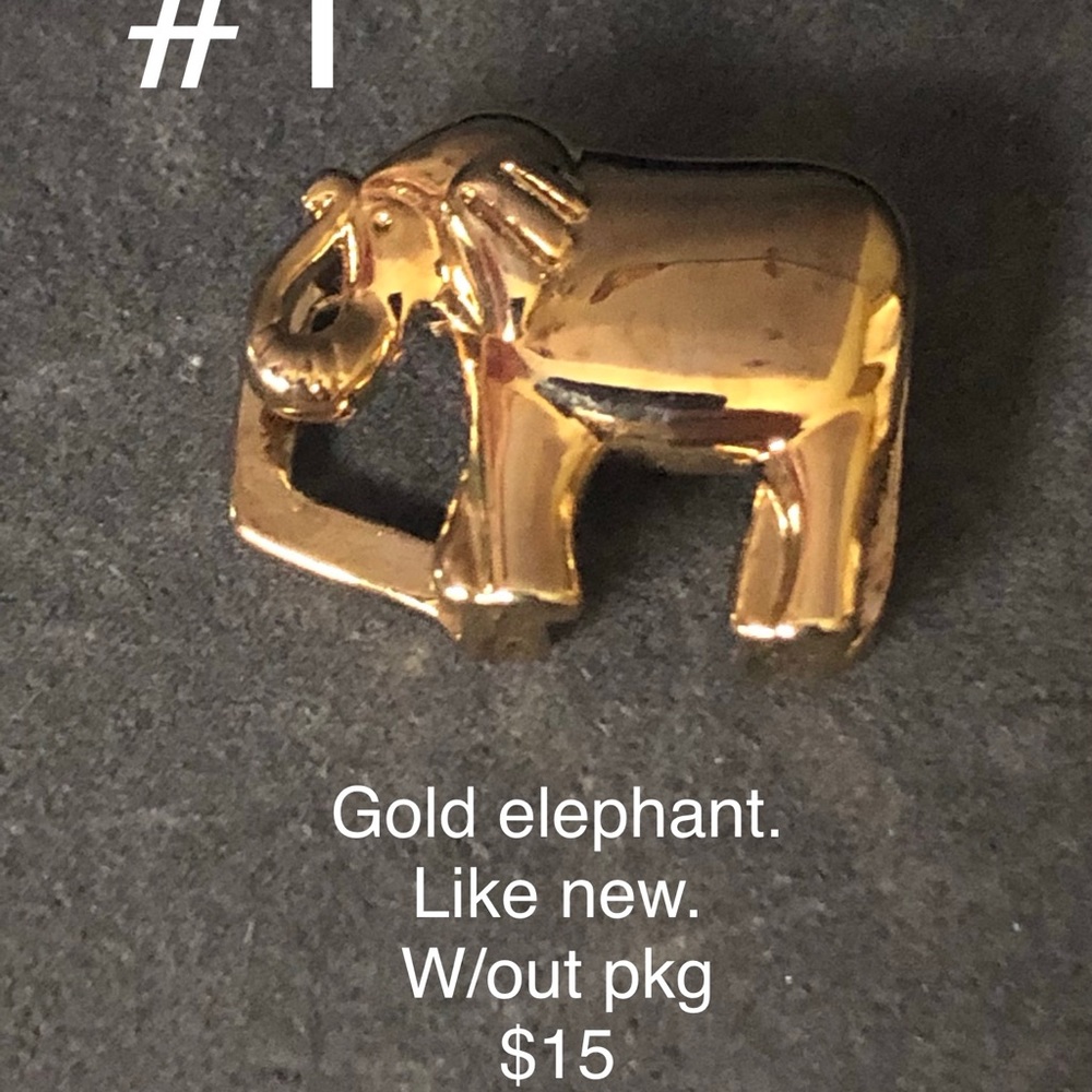 KEEP Collective gold elephant.